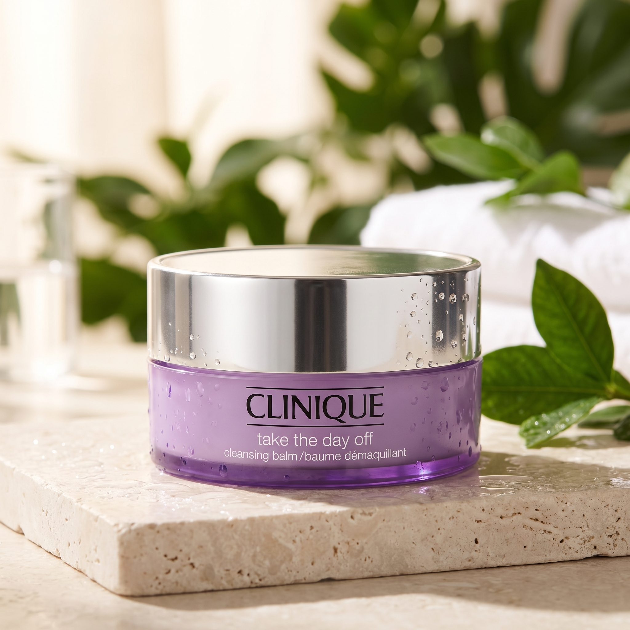 Clinique skincare set in spa-like scene with botanical greenery